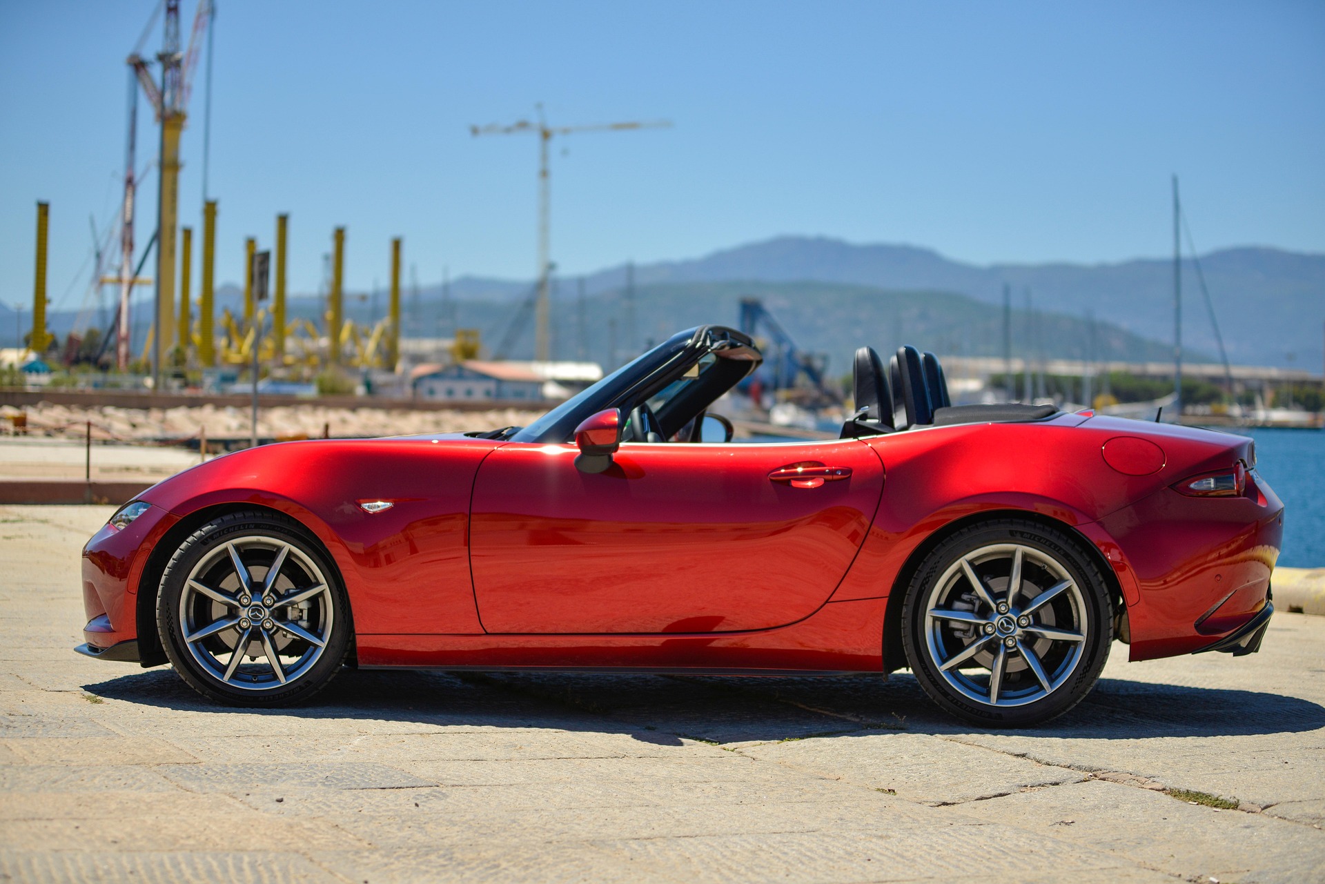 Red Mazda MX-5 convertible